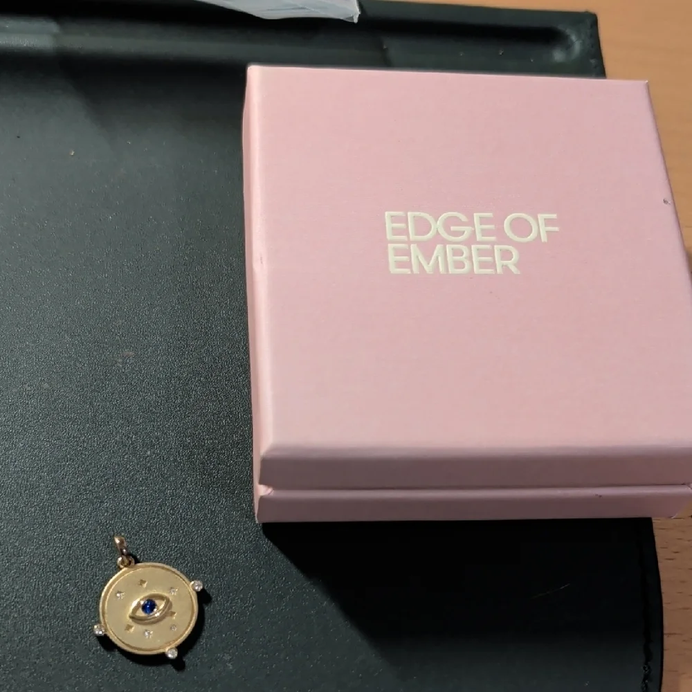 Gold Pendant with Blue Eye Design